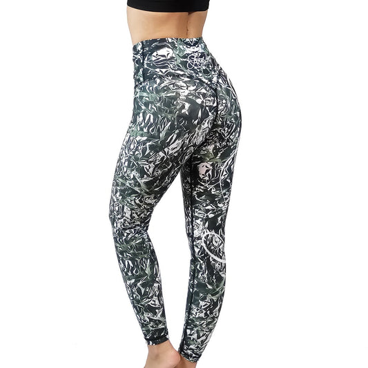 Anarchy apparel foil leggingsit, Korkeavyötäröinen ja takamuksesta sydämenmuotoinen leikkaus. Upea kuviointi. Kuva mallin päällä takaa